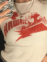 Top corto con estampado de escena hawaiana